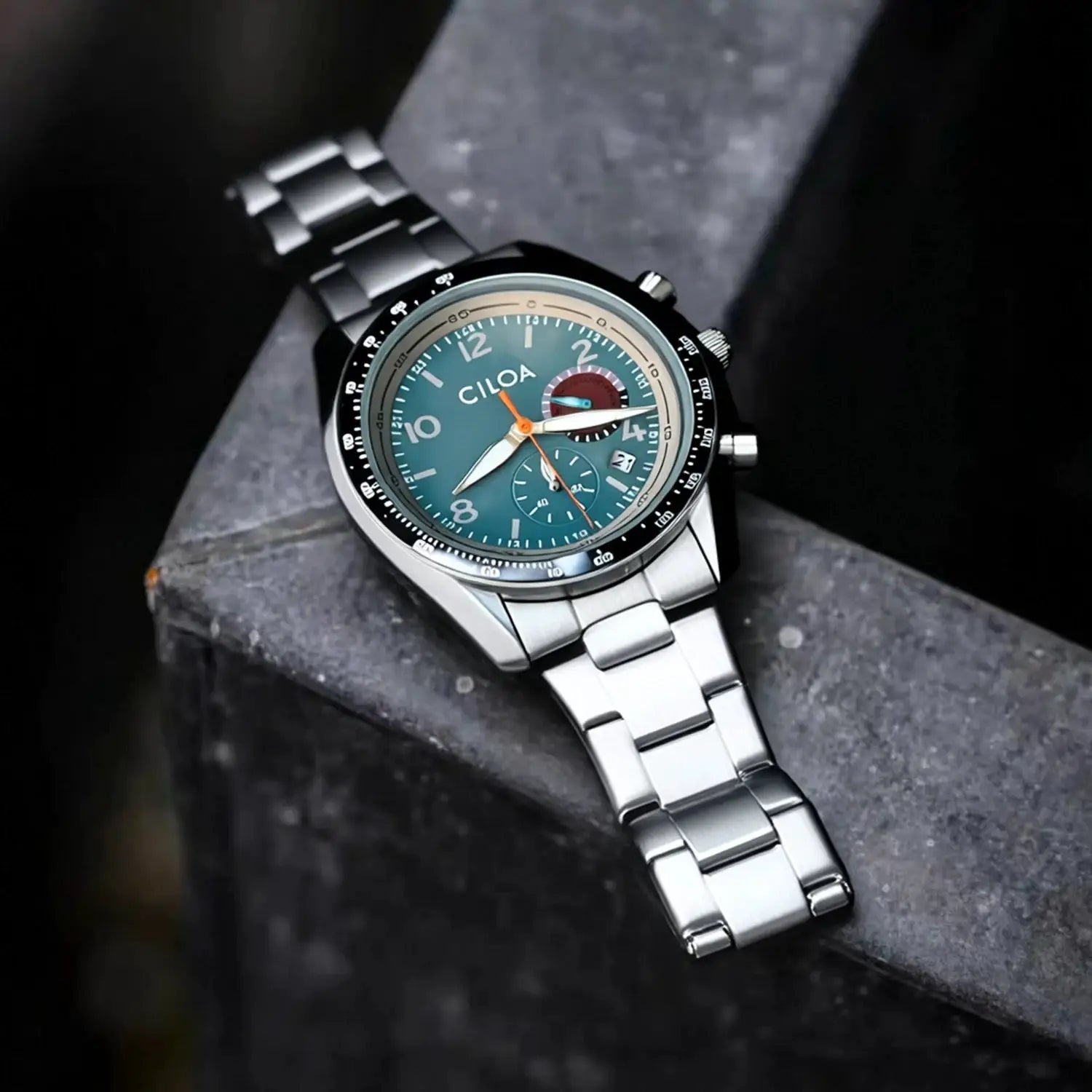 CILOA men's stainless steel waterproof quartz watch with teal dial, black bezel, and silver bracelet