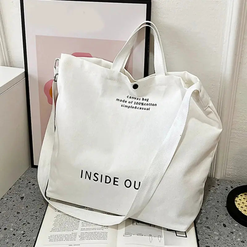 White canvas crossbody bag with long strap, unisex large-capacity tote for everyday use