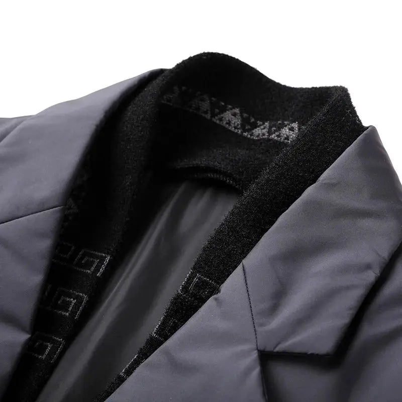 Men's winter down jacket with removable scarf collar, gray shell and black fleece lining.