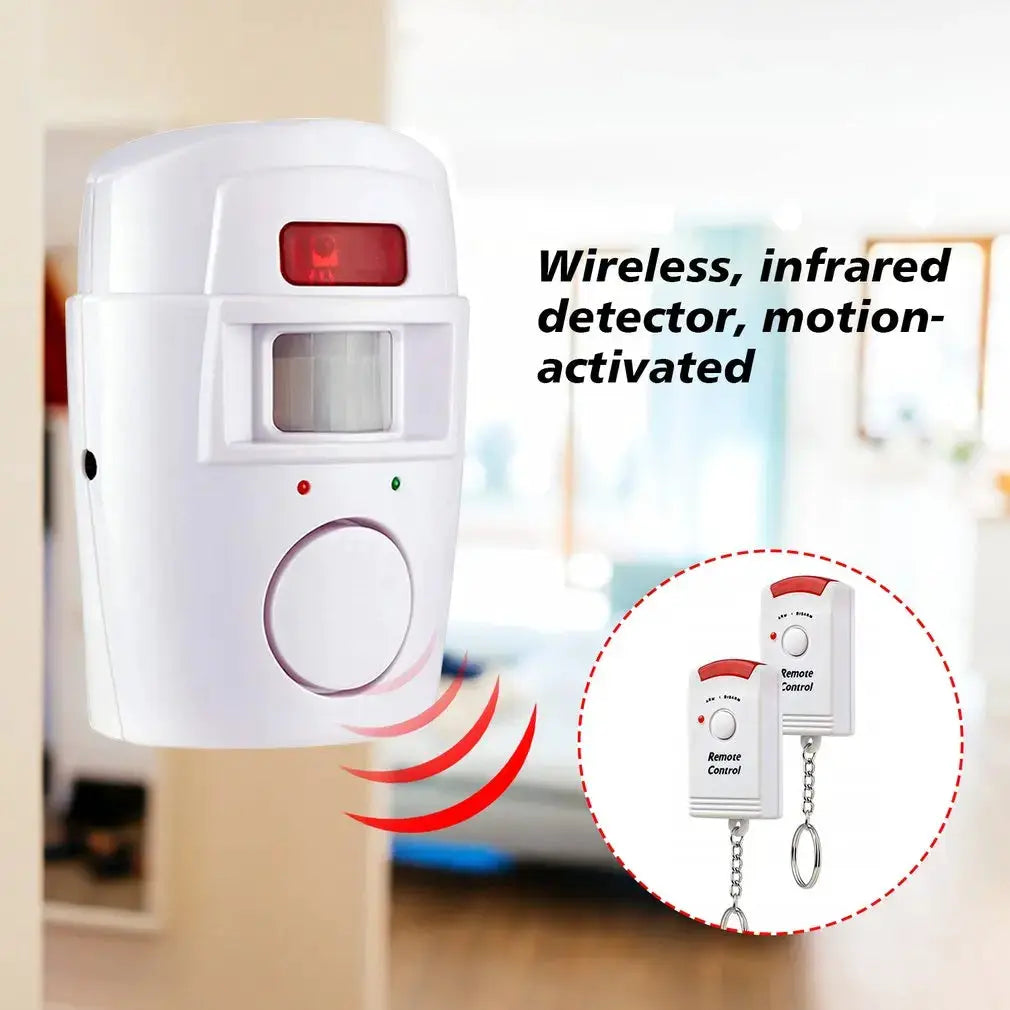 White wireless motion sensor alarm with two remote controls for indoor/outdoor security