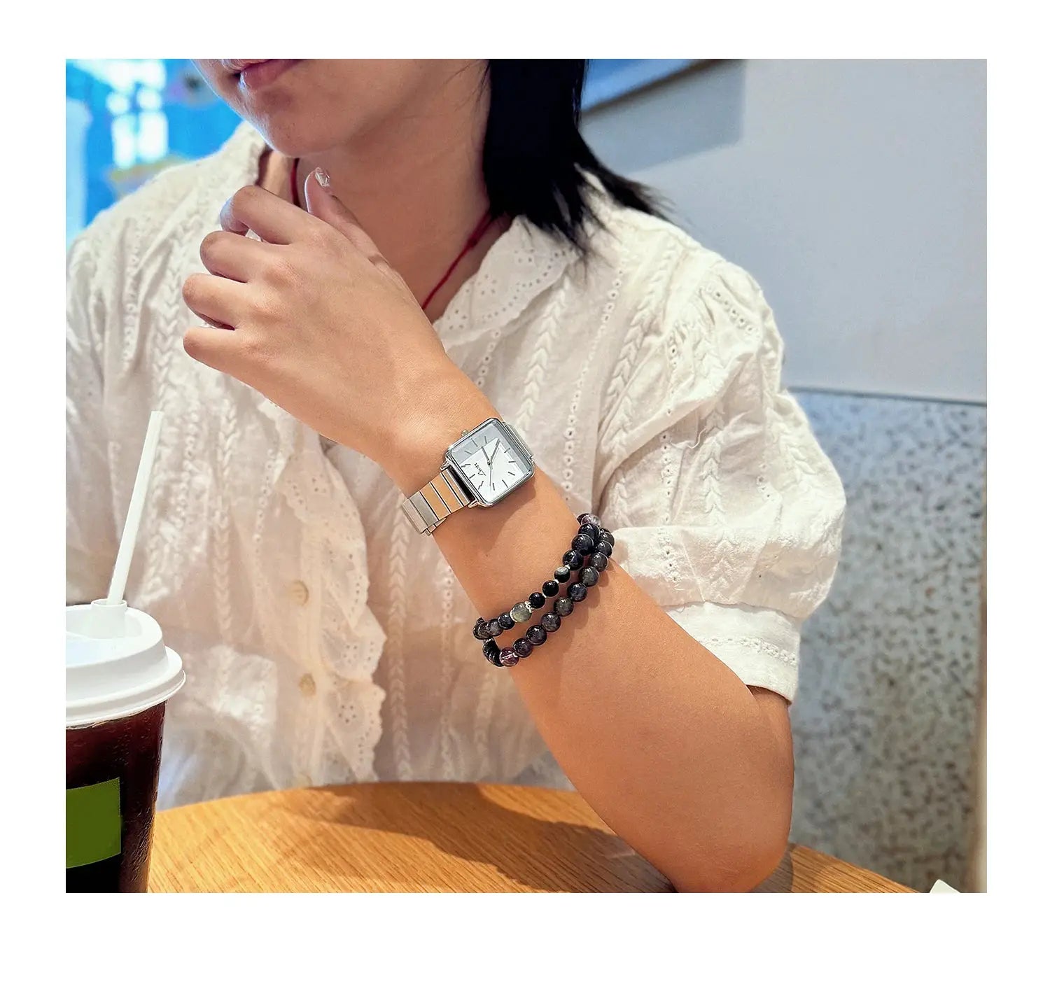 Women's square-dial watch by Simples Market with a two-tone gold and silver stainless steel strap