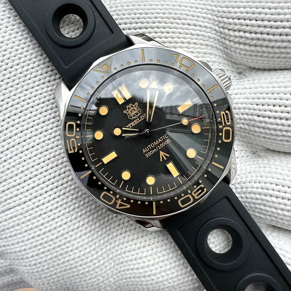 STEELDIVE SD1957 42mm dive watch with black dial, gold markers, ceramic bezel, and rubber strap