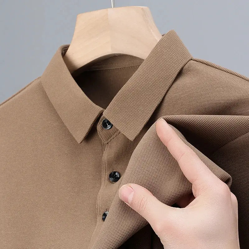 Men's classic polo shirt with collar in brown, textured knit, short sleeves, button placket