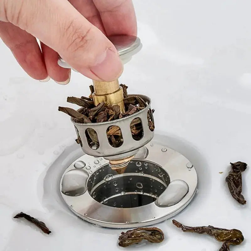 Simples Market metal bathtub drain stopper with pop-up hair catcher filter, stainless steel.