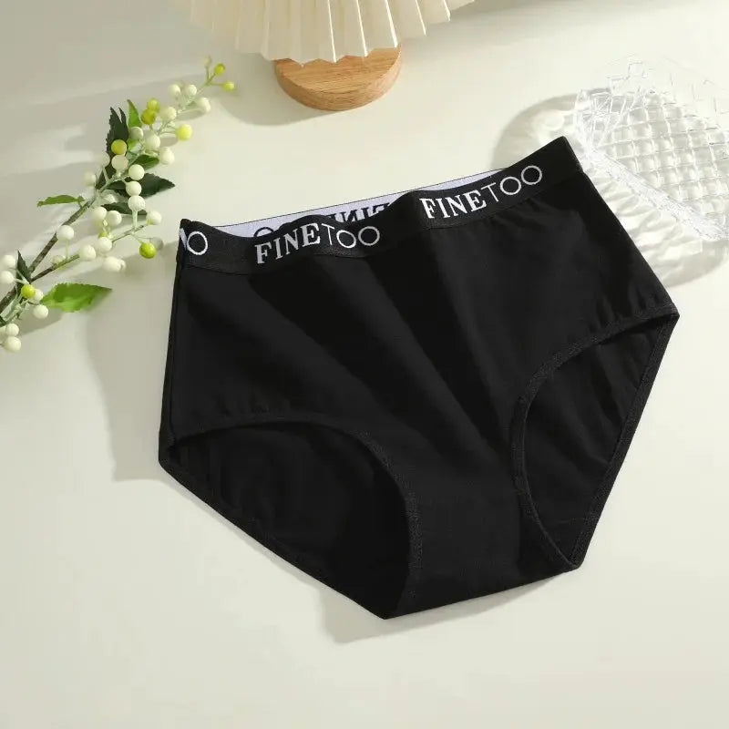 Women's black seamless cotton briefs by Finetoo with white branded waistband