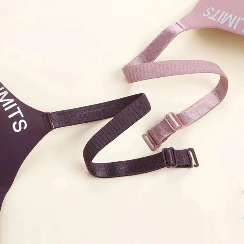 Simples Market bralette with dark plum cup and pink and purple adjustable straps with metal sliders