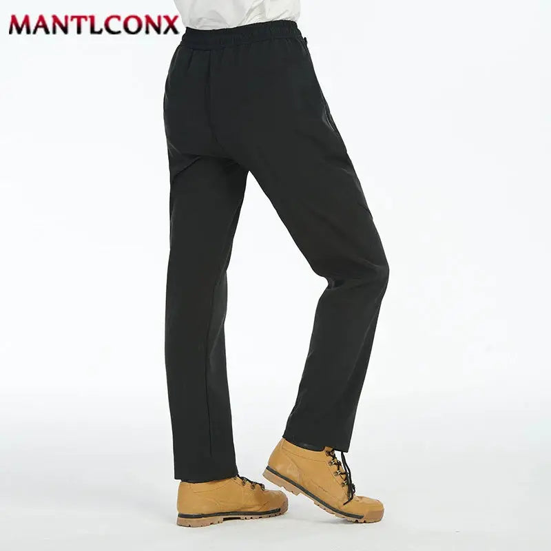 Men's black breathable jogger pants with elastic waist and quick-dry fabric; MANTLCONX logo visible