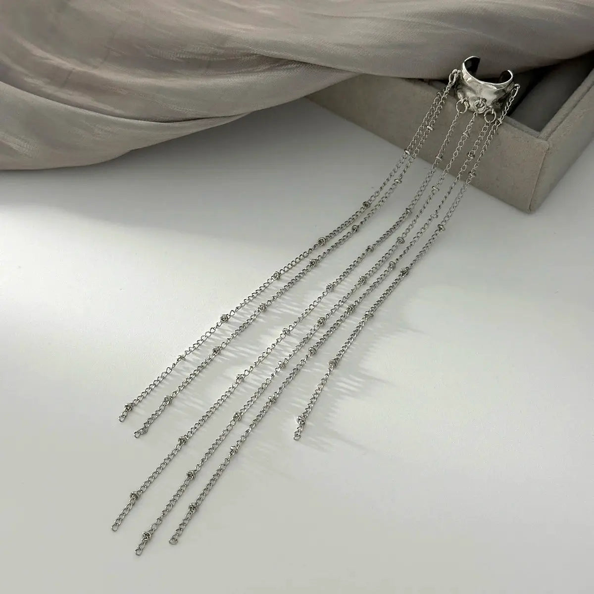 Elegant silver-tone long tassel ear cuff clip earrings with multiple chains, no piercing required