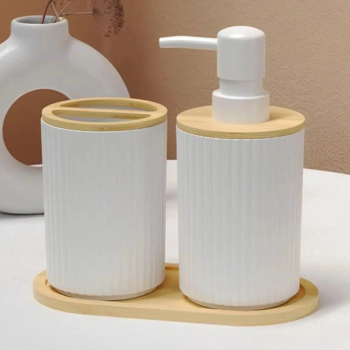 2-piece white ceramic bathroom set with bamboo lids and base, soap dispenser with pump and toothbrush cup