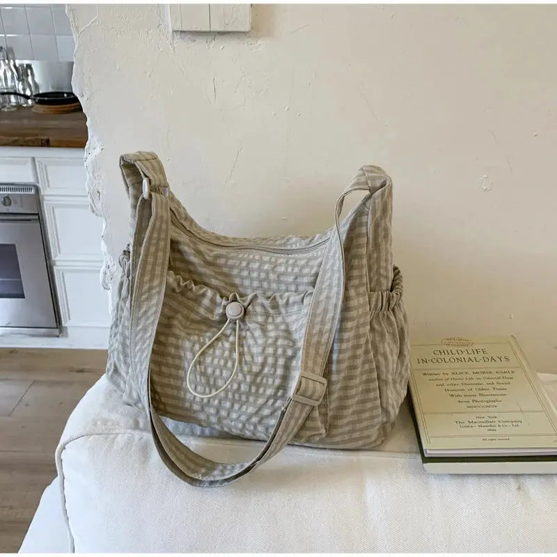 Korean nylon plaid shoulder bag with front drawstring pocket, beige/gray tones, crossbody tote