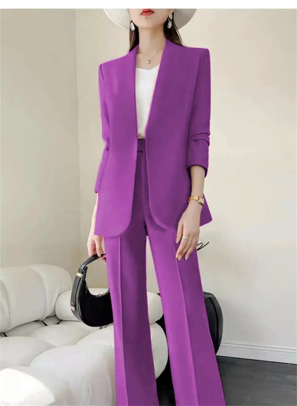 Purple two-piece women's pantsuit with blazer and wide-leg pants