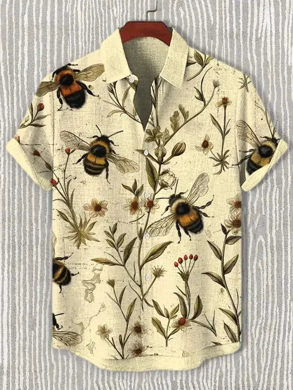 Men's short-sleeve Hawaiian shirt with bees and botanical print on beige.