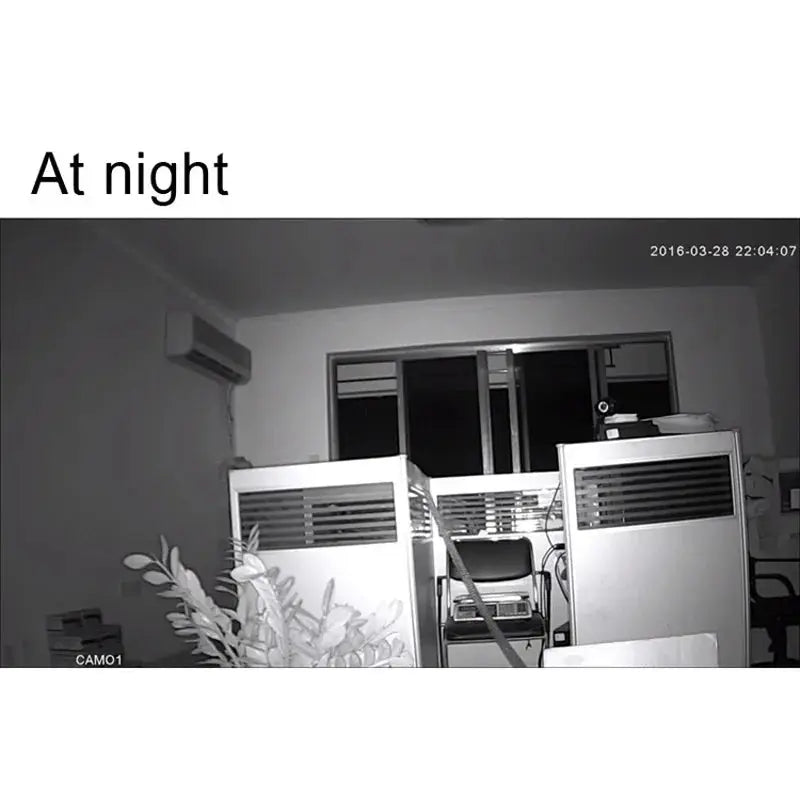 JIENUO 4K AHD CCTV camera feed at night with infrared vision in an office cubicle setting