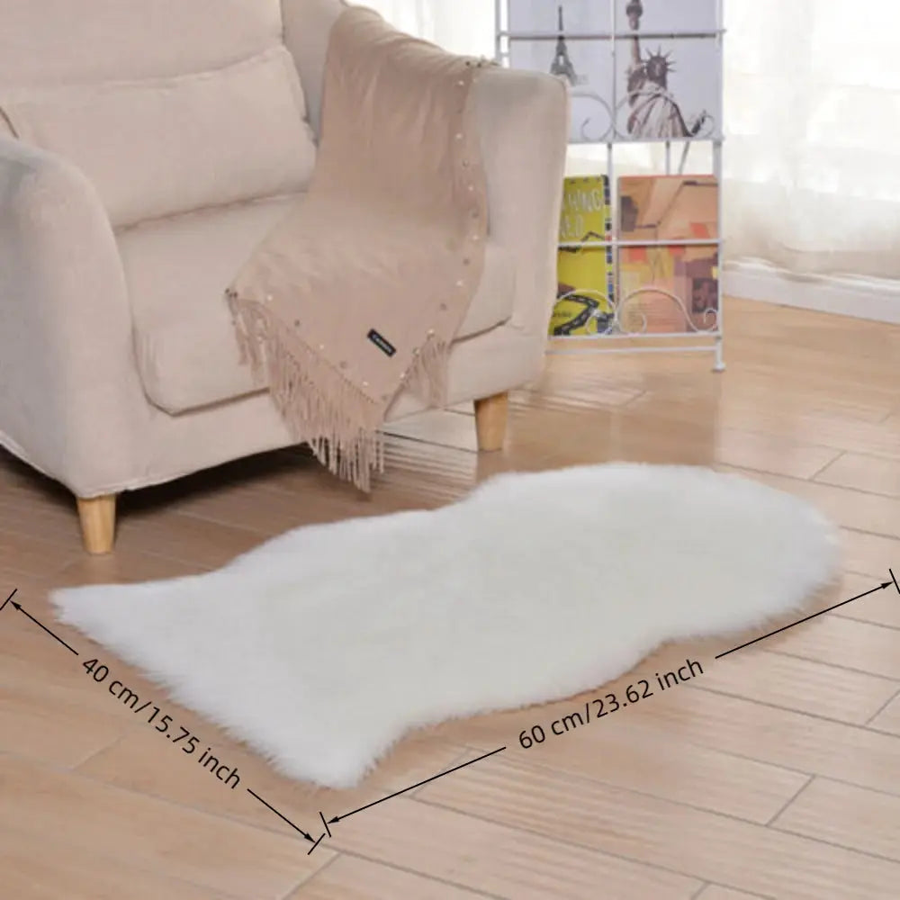 Artificial sheepskin long-hair rug, white fluffy shag mat for home decor on wooden floor.