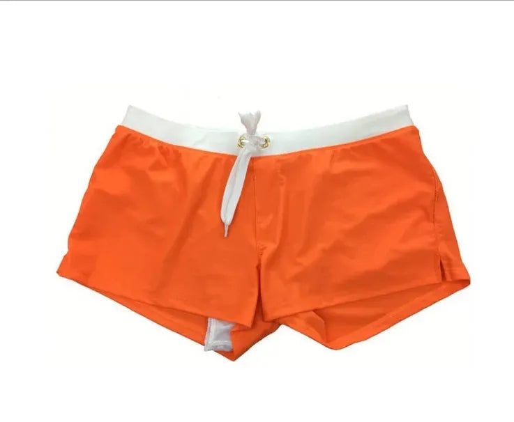 Men's orange quick-drying swim trunks with white waistband and drawstring