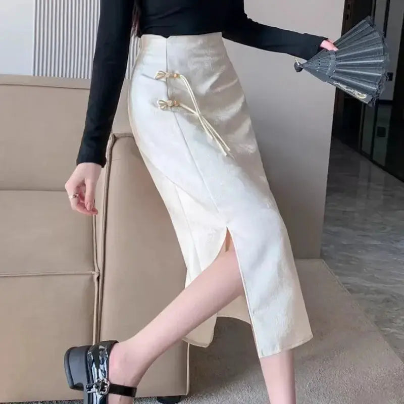 Chinese-style high-waist skirt in cream with side slit and decorative frog closures