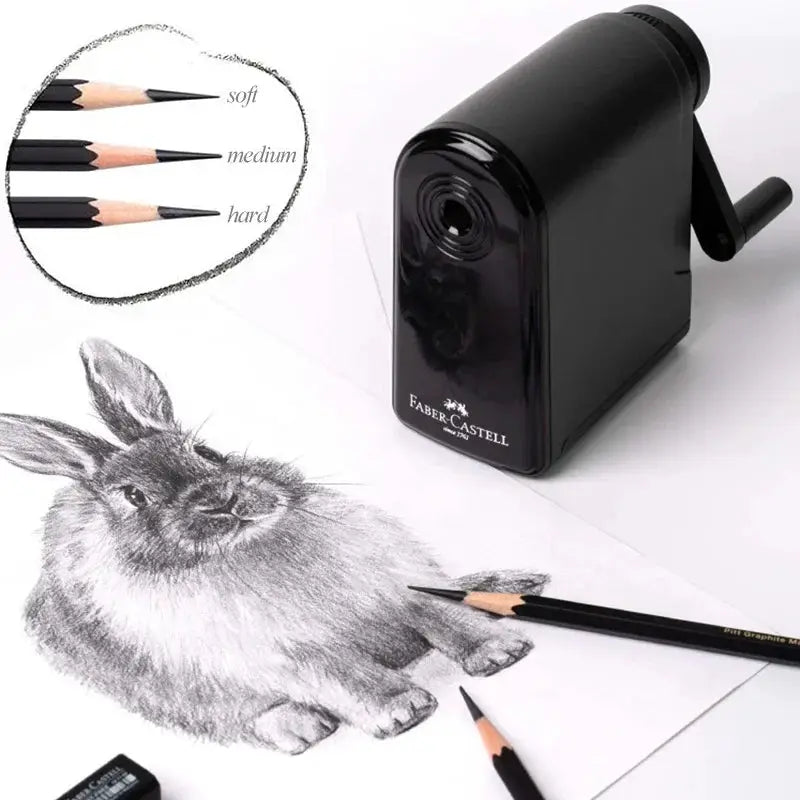 Faber-Castell black hand-crank large-capacity pencil sharpener, shown with sketch pencils and a rabbit sketch