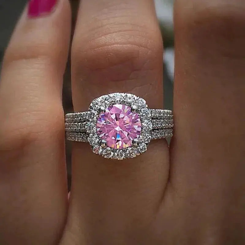 Huitan pink cubic zirconia halo ring with triple pave bands in brass, by Simples Market