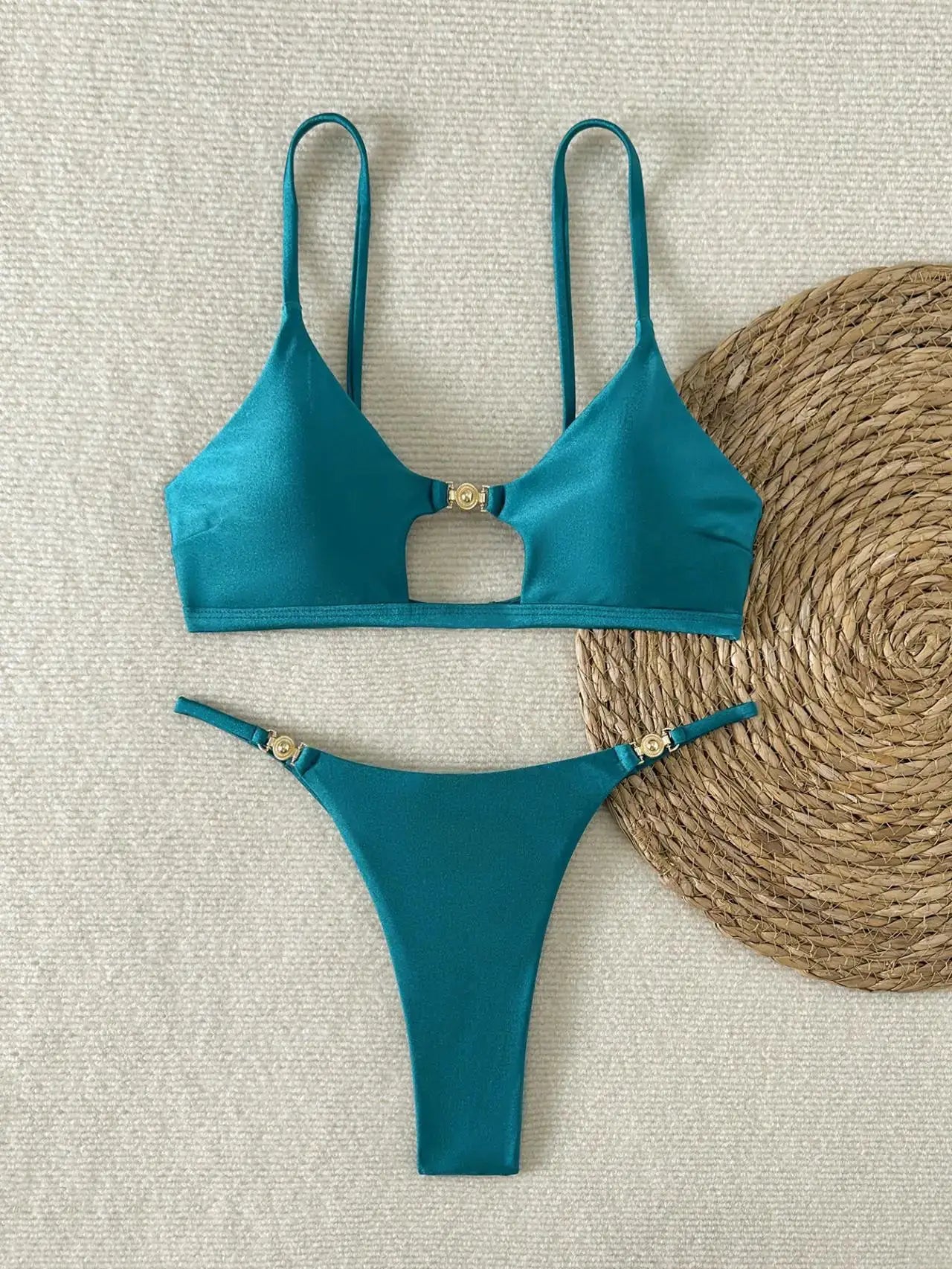Simples Market teal bikini set with push-up triangle top, center ring detail, and high-cut cheeky bottoms with gold hardware