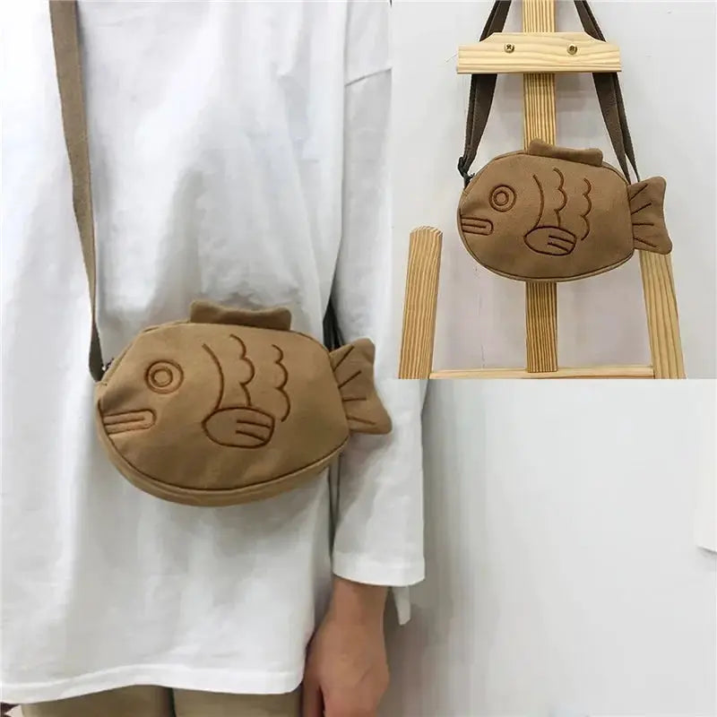 Fish-shaped canvas crossbody bag by Simples Market, brown embroidery, zippered mini purse.