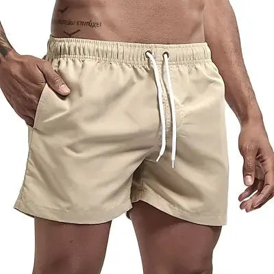 Men's beige swim shorts with white drawstring and side pockets, quick-dry board-style trunks