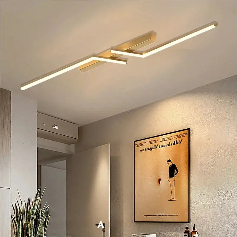Modern LED ceiling light with gold finish and linear design for bedroom or living room