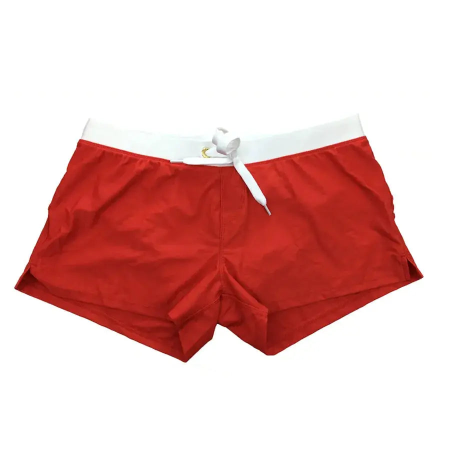 Men's red quick-dry swim trunks by Simples Market with white drawstring waistband; boxer shorts style