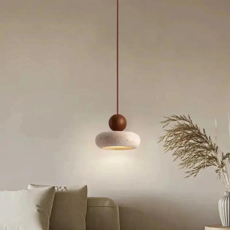 Vintage pendant light with natural yellow agate stone, wooden accent, and white speckled shade.