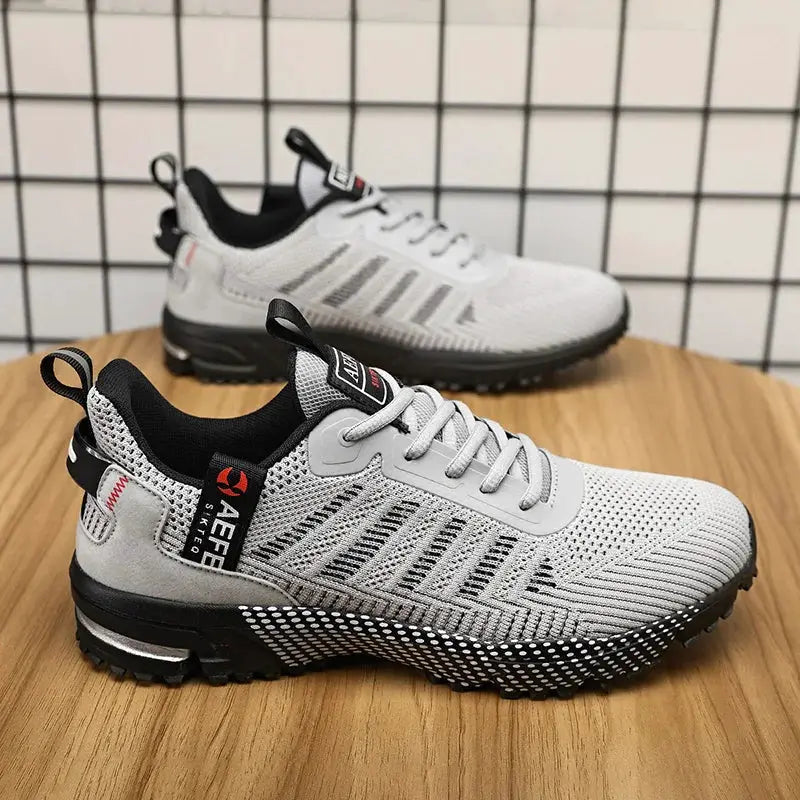 Men's grey breathable mesh running shoes, two pairs shown