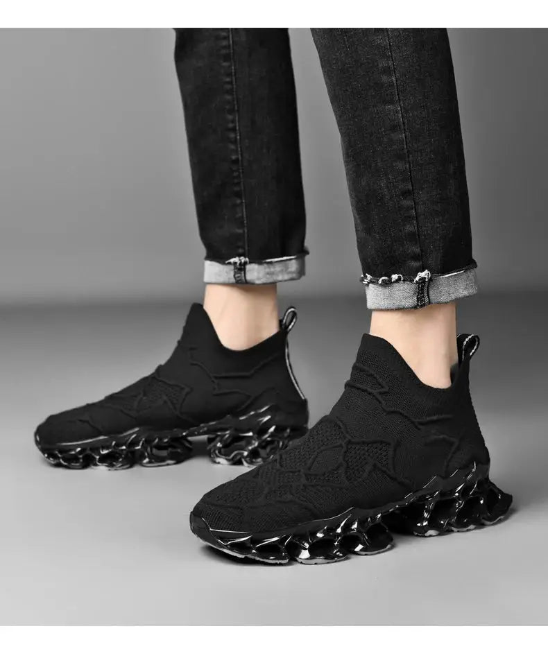 Men's black knitted sneakers with a chunky translucent linked sole, casual athletic shoes.