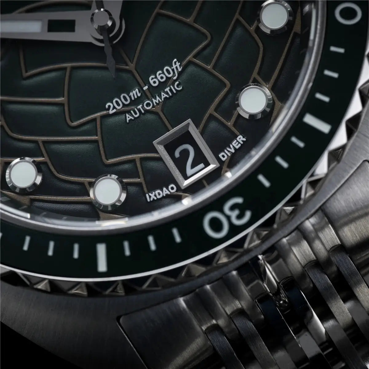IXDAO IPOSE 2026 diving watch with Poseidon-pattern dark green dial, automatic, 200m stainless steel bracelet.