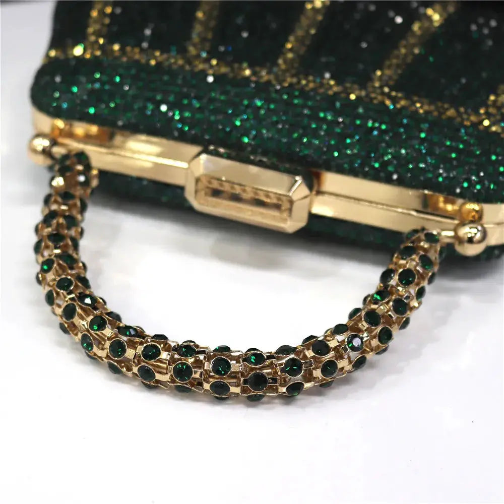 Emerald rhinestone evening clutch with gold-tone chain handle and diamond-style embellishments