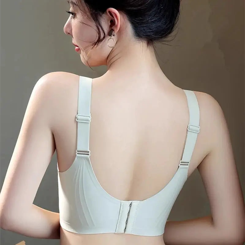 Bra by Simples Market; white back-closure with wide straps for large-breast wearers.