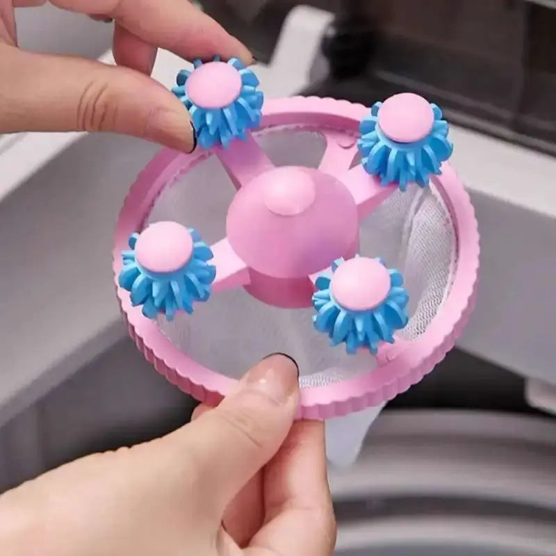 Washing machine filter bag circular pink net with blue rotating lint-catching brushes from Simples Market