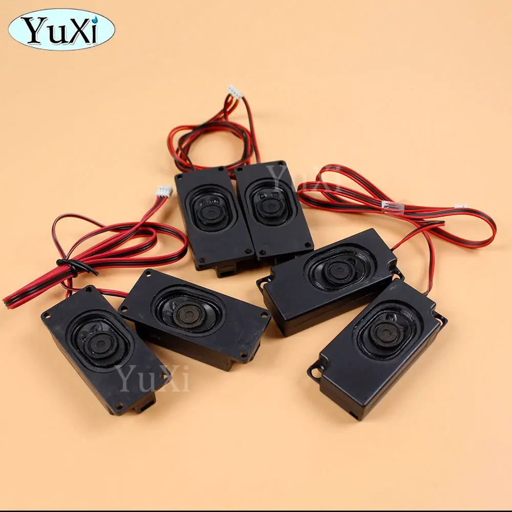 Six black rectangular PC speakers with red wiring, YuXi logo visible