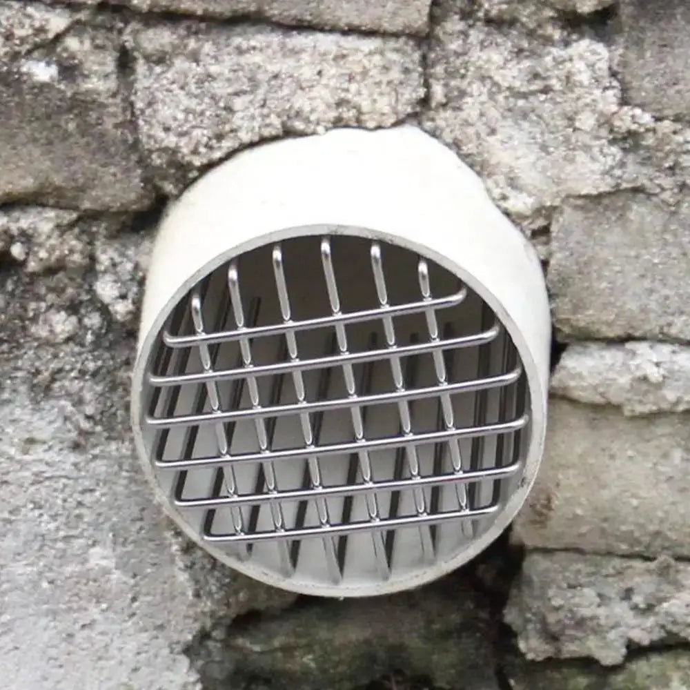 Round white roof drain cover with stainless steel grille by Simples Market.