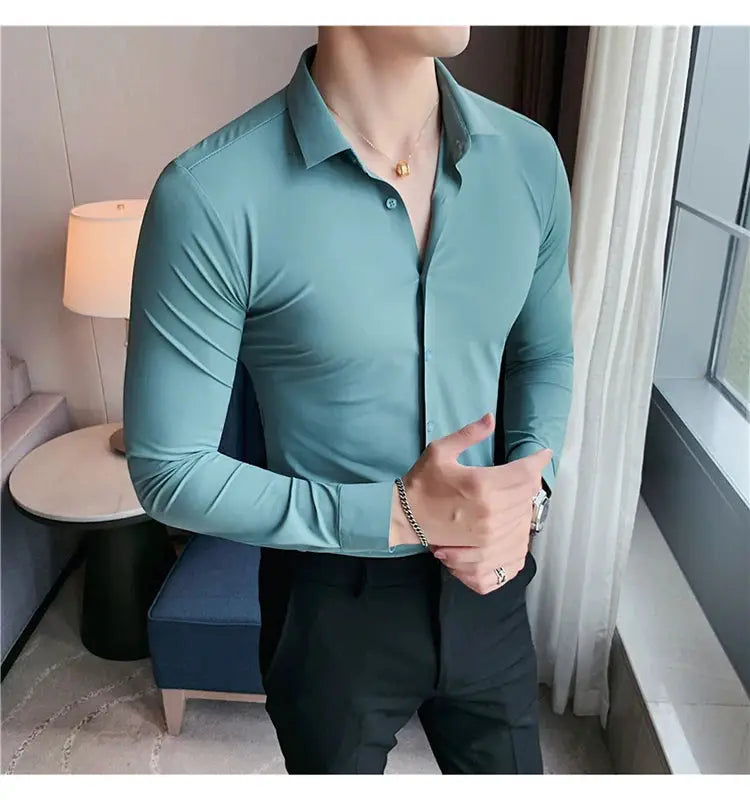 Plus-size men's teal long-sleeve shirt with high-elasticity seamless fit, slim casual/formal top