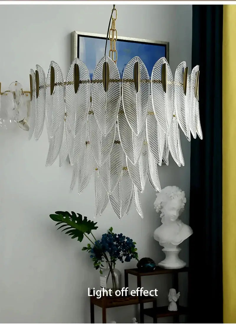French Romantic glass chandelier with leaf-shaped clear glass pendants and gold chain