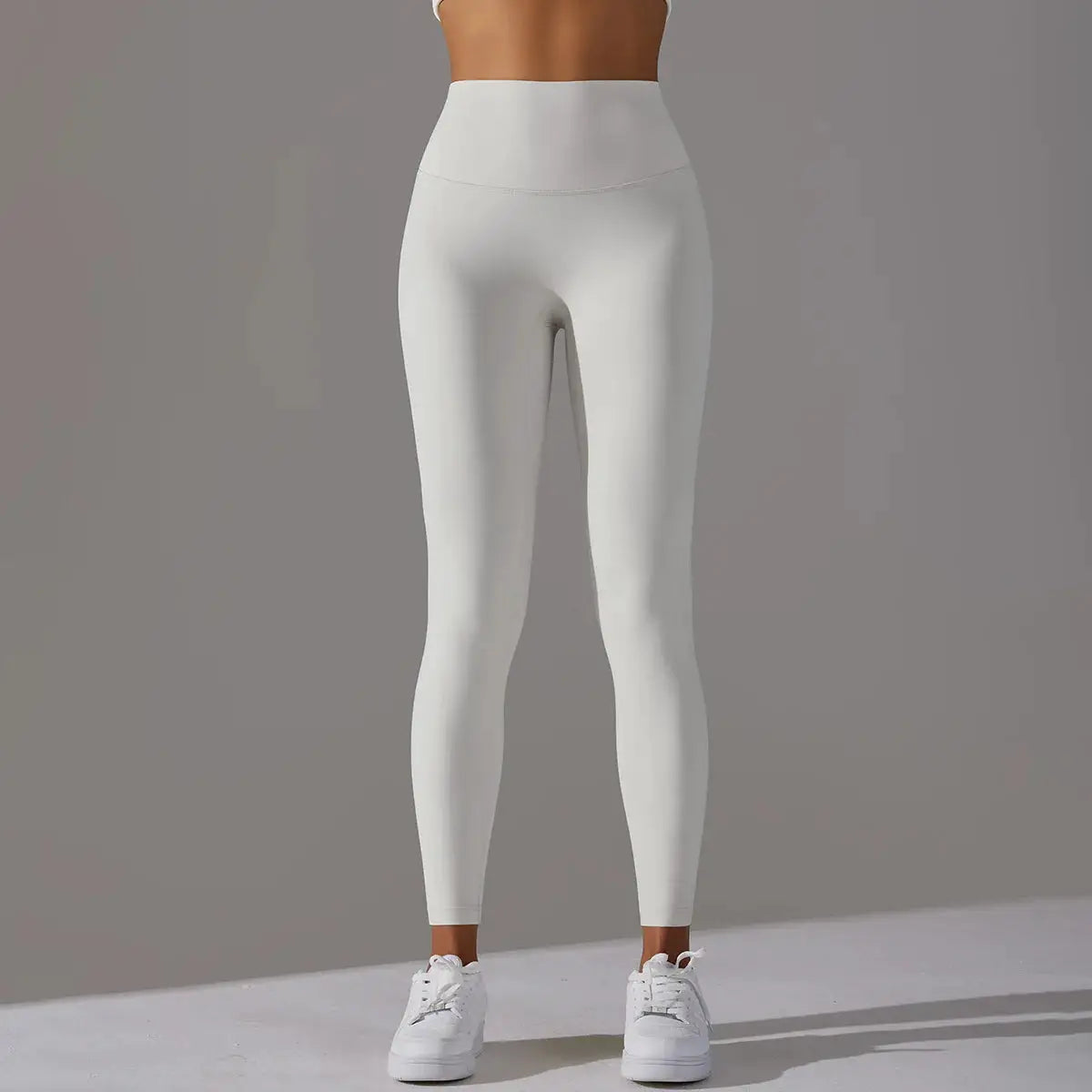 High waist naked-feeling leggings, white; women's gym/yoga leggings with full length and stretch fabric.