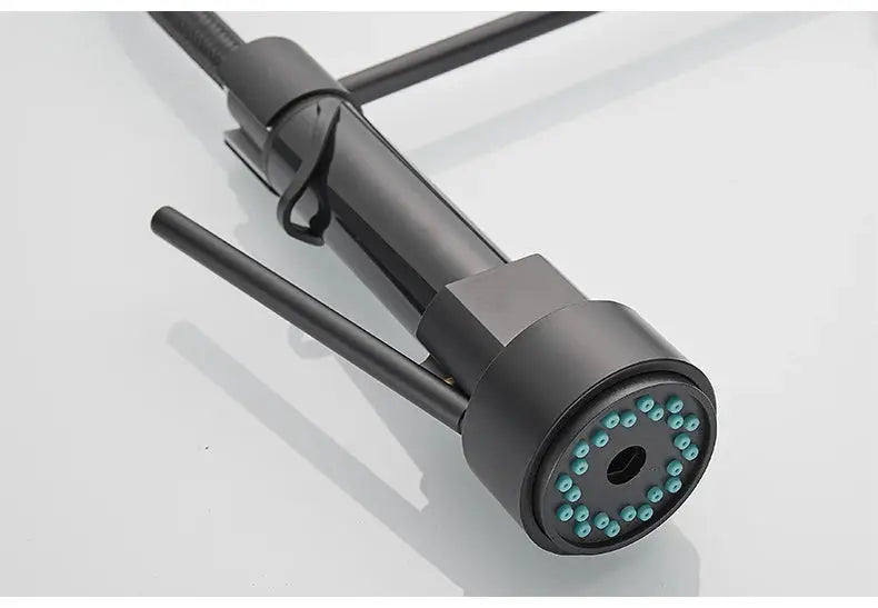 Kitchen faucet by Simples Market with pull-down sprayer, matte black finish, high-arc, single-handle.