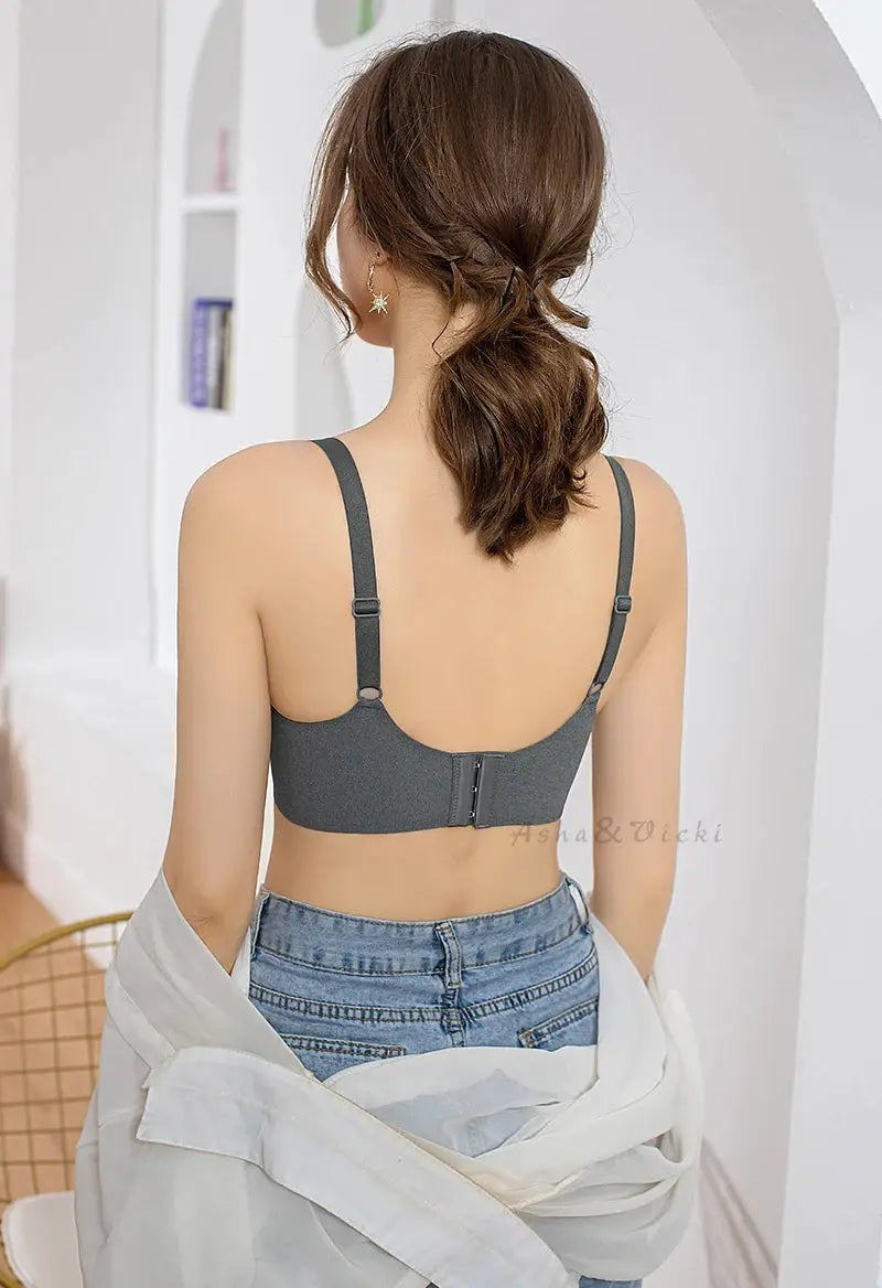 Gray latex cup bra with adjustable straps and back clasp closure