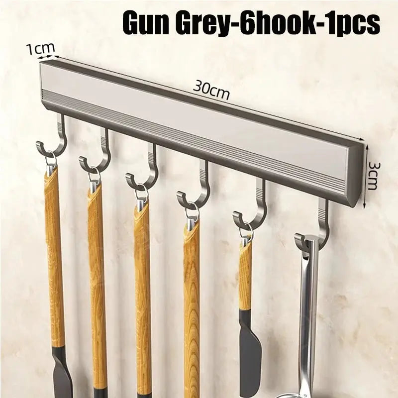 Wall-mounted kitchen utensil rack in gun-grey aluminum with six hooks for utensils