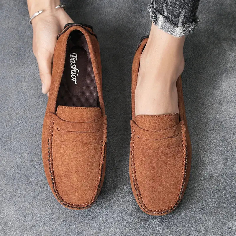 Pair of men's brown suede loafers by Simples Market slip-on driving shoes