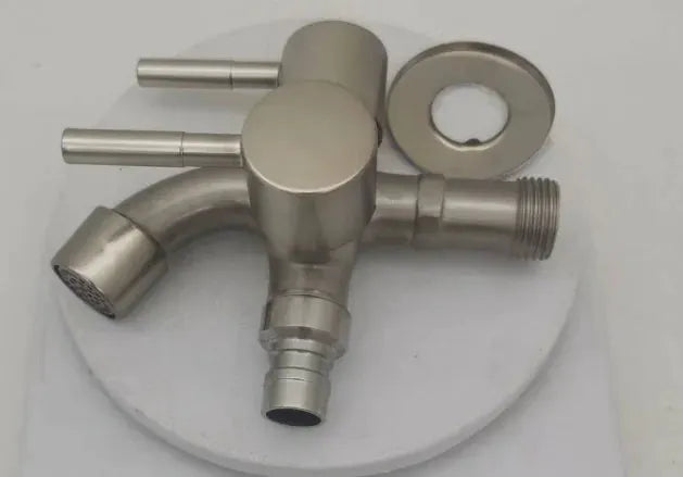 Dual-spout water tap by Simples Market in stainless steel with double outlets and circular mounting plate