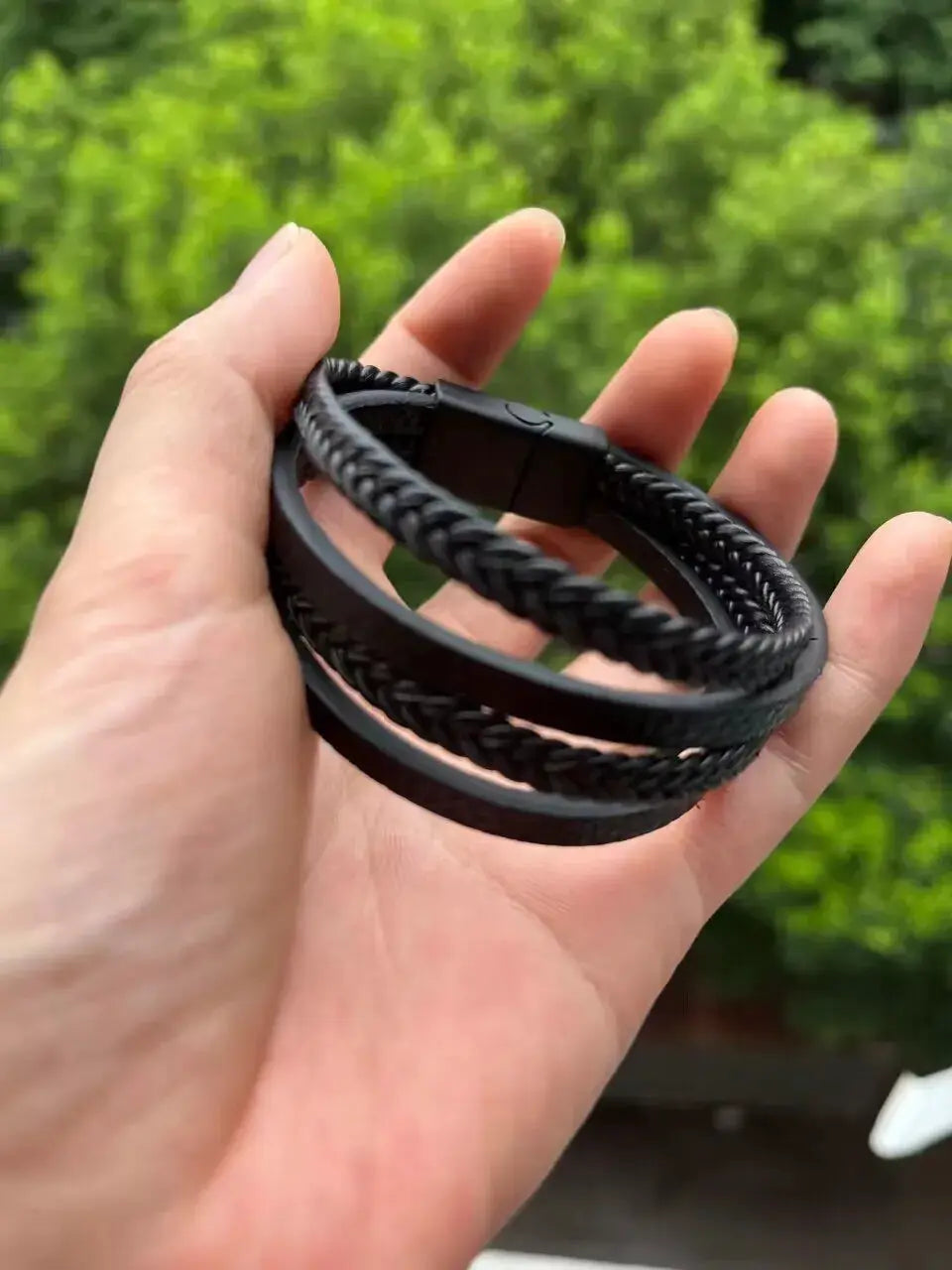 Men's black leather bracelet set with stainless steel accents; multilayer braided rope cuff