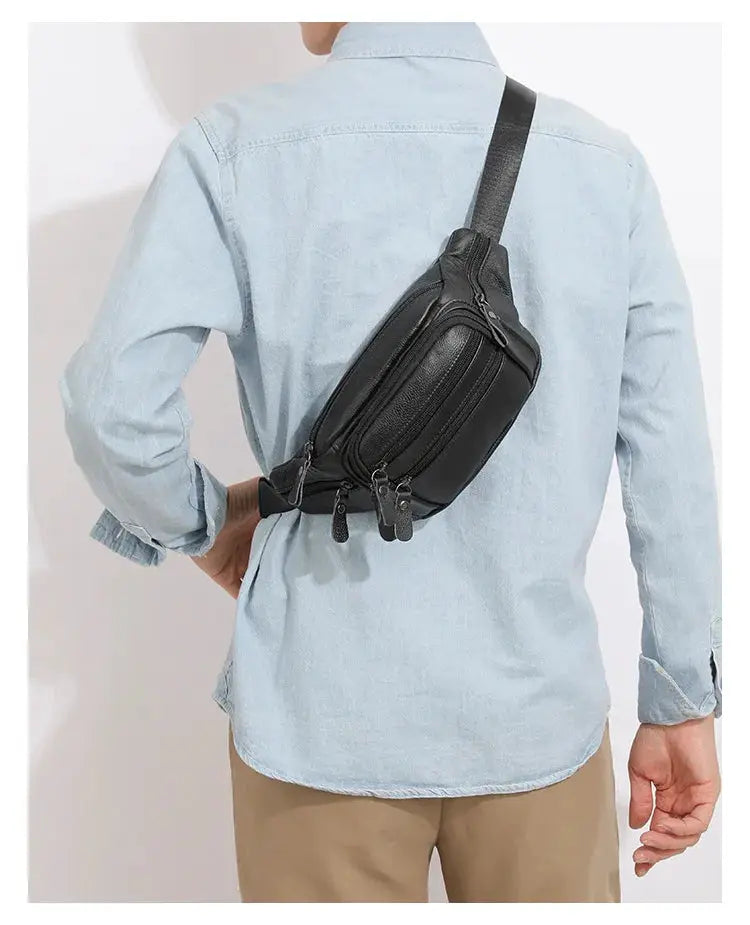 Leather fanny pack for men by Simples Market; black genuine leather waist bag worn across the back.