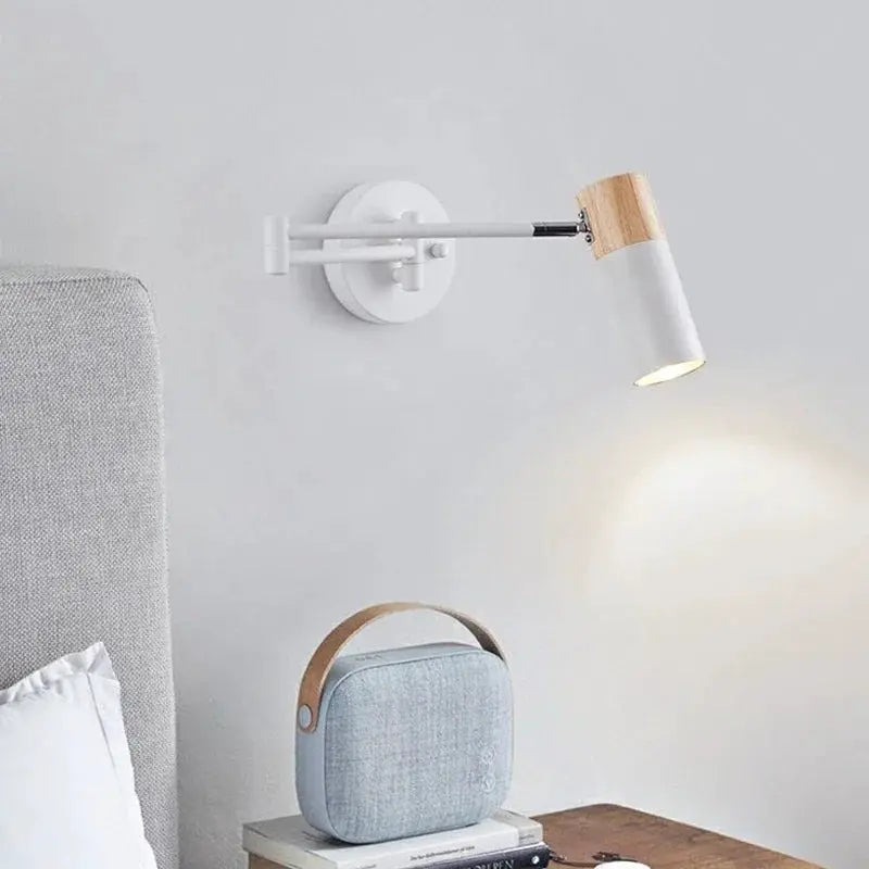 Modern white wall-mounted telescopic rocking-arm lamp with wood accent, Simples Market