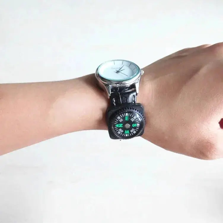 Small outdoor compass on a black wrist strap (<21mm) with a metal watch
