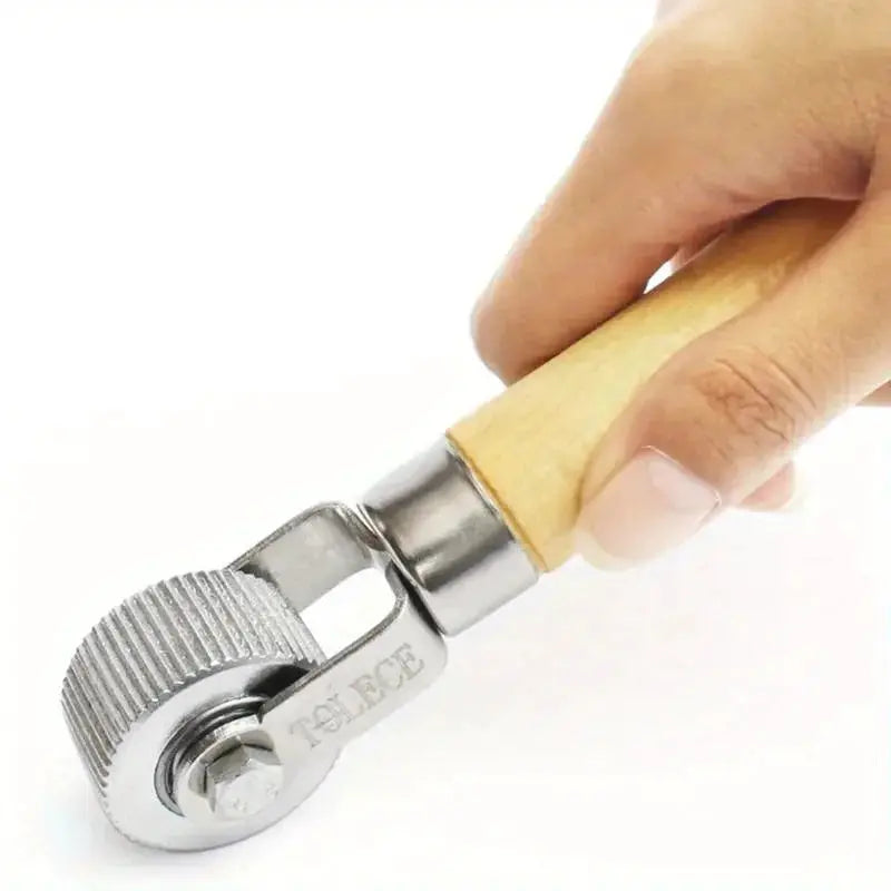 Tire repair roller with wooden handle and metal head by Simples Market for cars and motorcycles