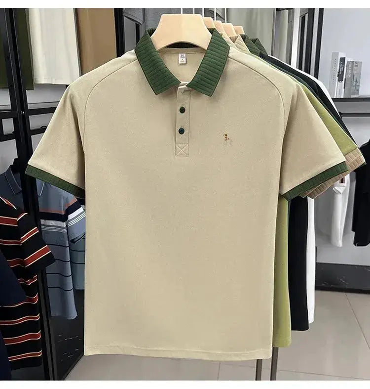 Men's polo shirts by Simples Market; beige with green collar and cuffs, dog embroidery